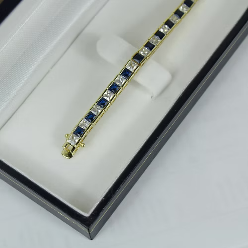 Yellow Gold Finish Created Diamond Blue Sapphire Princess Cut Tennis Bracelet