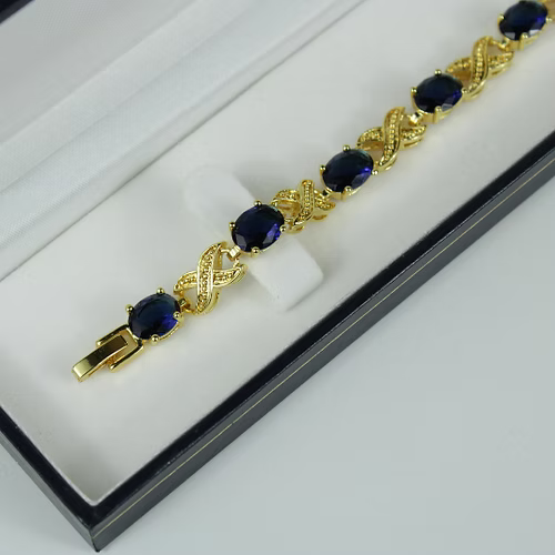 Yellow Gold Finish Sapphire Love And Kisses Bracelet