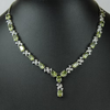 White Gold Finish Peridot Love And Kisses Necklace
