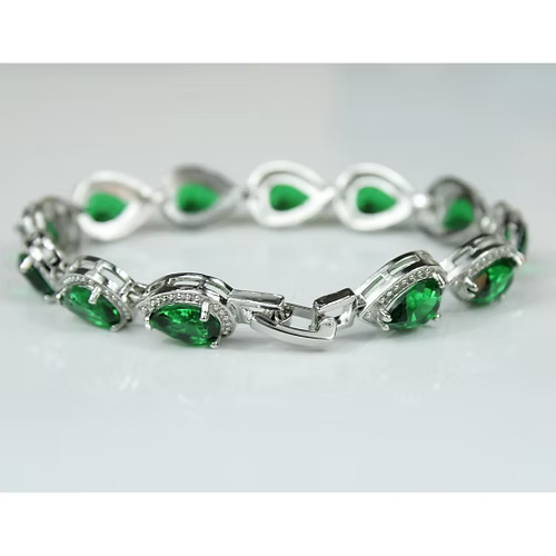 White gold finish Green Emerald And created diamond Pear Cut bracelet