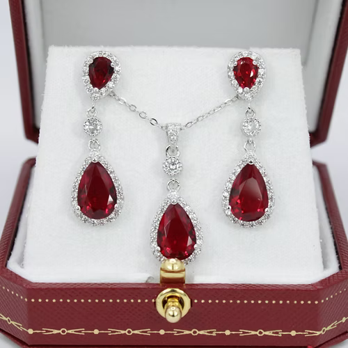 White Gold Finish Created Diamond And Red Ruby Pear Cut Dangle Set