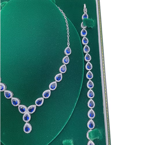 White Gold Finish Blue Sapphire Pear Cut and Created Diamond Necklace, Earring