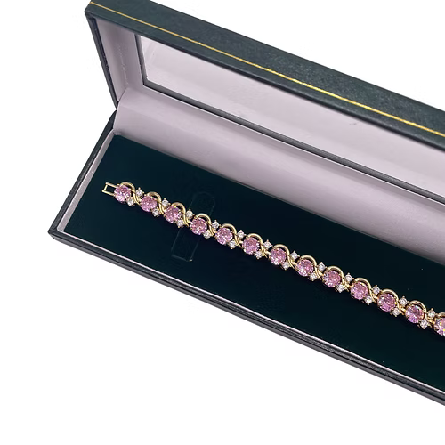 Yellow gold finish pink tourmaline round cut twisted created diamond bracelet