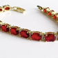 Yellow gold finish red ruby and created diamond Oval tennis bracelet gift idea