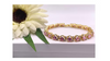 Yellow gold finish pink tourmaline round cut twisted created diamond bracelet