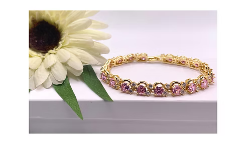 Yellow gold finish pink tourmaline round cut twisted created diamond bracelet