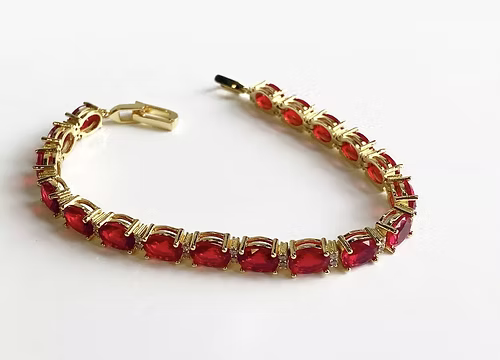 Yellow gold finish red ruby and created diamond Oval tennis bracelet gift idea