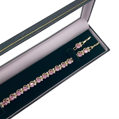 Yellow gold finish pink tourmaline round cut twisted created diamond bracelet